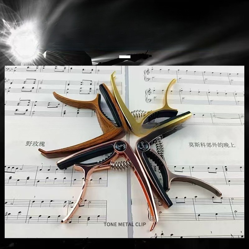 Musical Instrument Guitar Capo - огляд і ціна Musical Instrument Ending In A