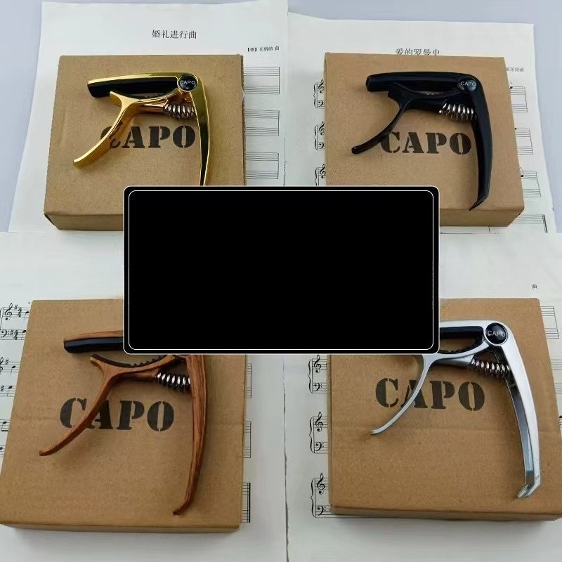 Musical Instrument Guitar Capo - огляд і ціна Musical Instrument Ending In A